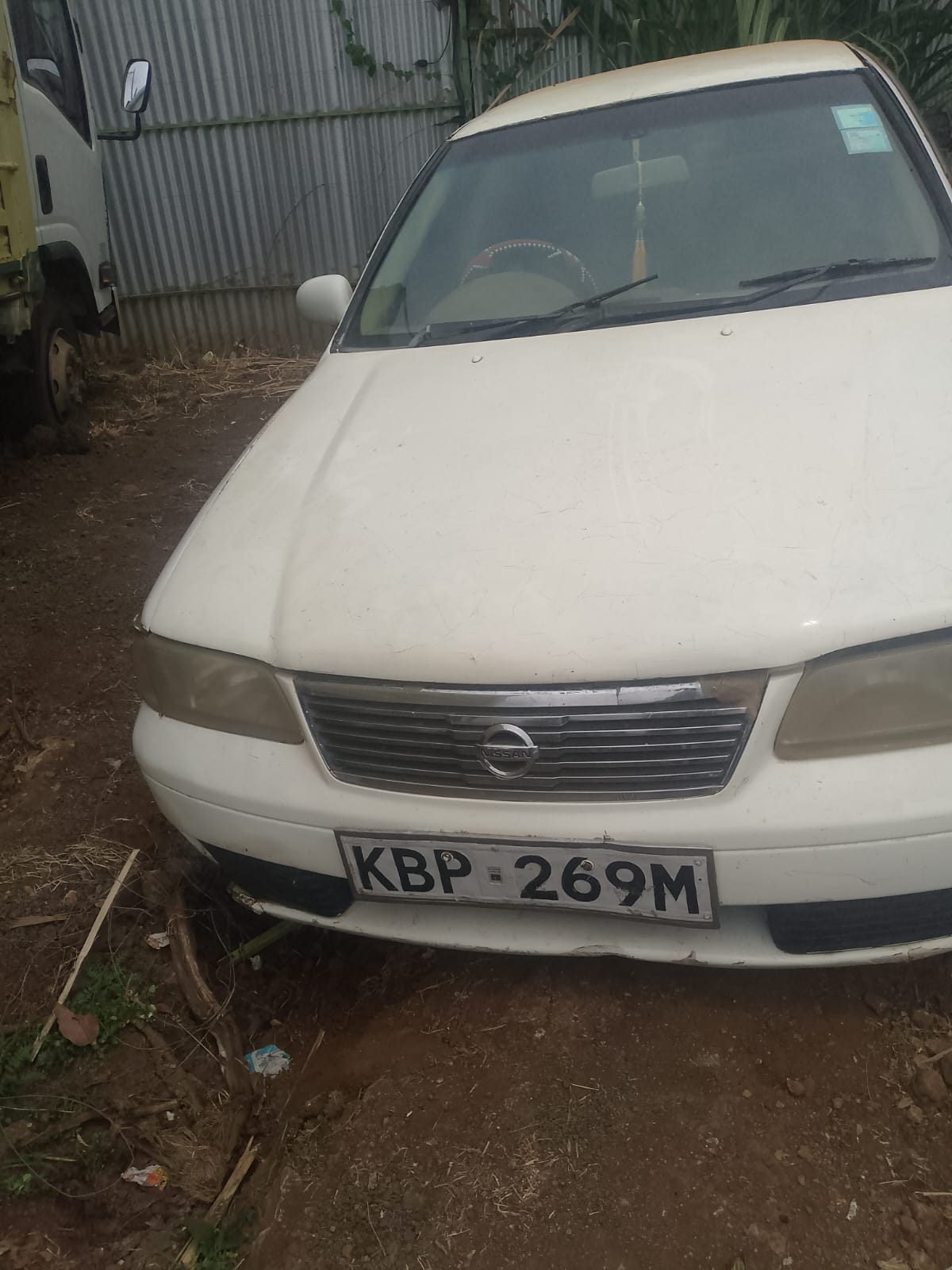 2004 Nissan SUNNY white – photo 1